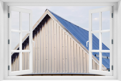 Fototapeta Naklejka Na Ścianę Okno 3D - The roof of corrugated sheet
