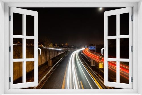 Fototapeta Naklejka Na Ścianę Okno 3D - traffic in city on german highway at night in erlangen