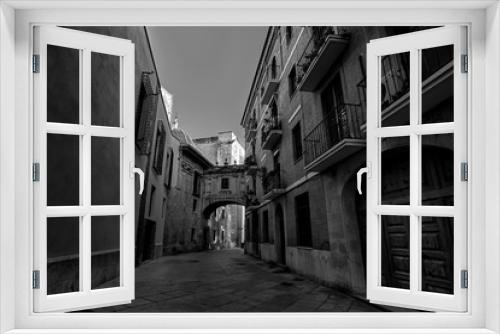 Fototapeta Naklejka Na Ścianę Okno 3D - Valencia Spain Narrow Street with Arch Bridge Black and White Photography