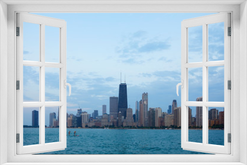 Fototapeta Naklejka Na Ścianę Okno 3D - Chicago Skyline at blue hour, seen from the North beach, Chicago, Illinois, United States
