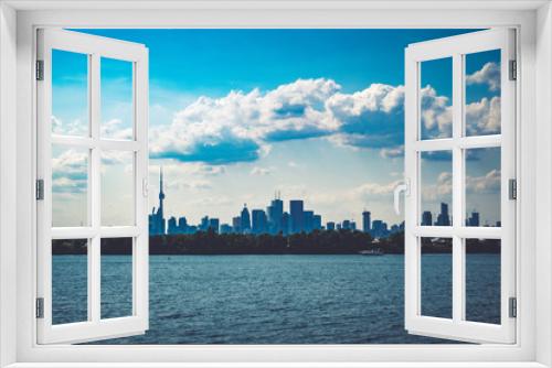 Fototapeta Naklejka Na Ścianę Okno 3D - Toronto skyline with a beautiful blue sky with clouds, Toronto, Ontario, Canada