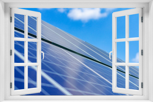 Fototapeta Naklejka Na Ścianę Okno 3D - Solar panels on blue sky background