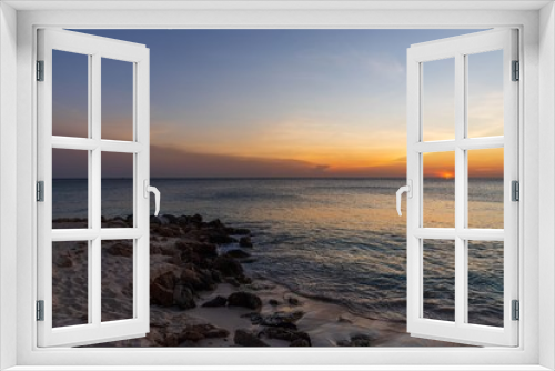 Fototapeta Naklejka Na Ścianę Okno 3D - Gorgeous colorful sunset on Caribbean sea, Unforgettable view of Aruba landscape. Beautiful nature background.