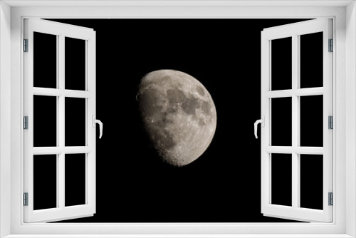 Fototapeta Naklejka Na Ścianę Okno 3D - Moon against a black sky.
