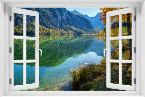 Fototapeta Naklejka Na Ścianę Okno 3D - Peaceful autumn Alps mountain lake with clear transparent water and reflections. Almsee lake, Upper Austria.