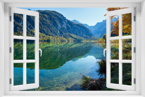 Fototapeta Naklejka Na Ścianę Okno 3D - Peaceful autumn Alps mountain lake with clear transparent water and reflections. Almsee lake, Upper Austria.