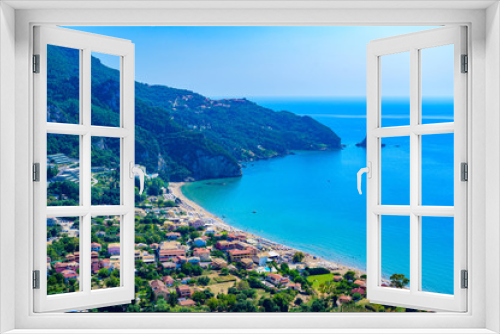 Fototapeta Naklejka Na Ścianę Okno 3D - Agios Gordios Beach with crystal clear azure water and white beach in beautiful mountain landscape scenery - paradise coastline of Corfu island, Ionian archipelago, Greece.