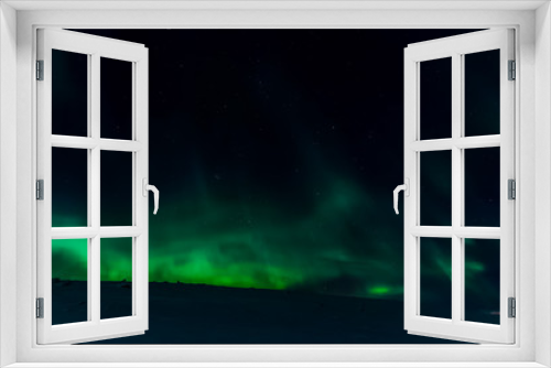 Fototapeta Naklejka Na Ścianę Okno 3D - Aurora borealis in night northern sky. Ionization of air particl
