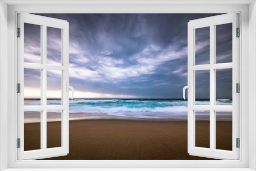 Fototapeta Naklejka Na Ścianę Okno 3D - Dramatic storm clouds on a rainy day over the ocean at a beach in rhode island usa