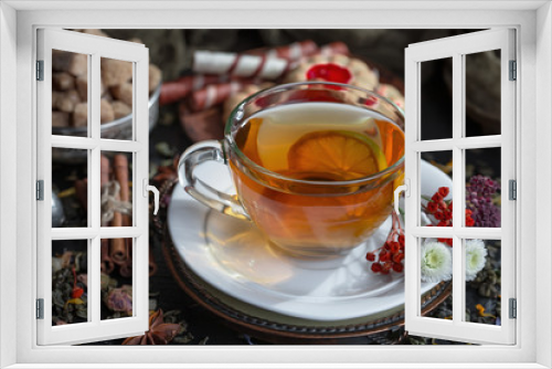 Fototapeta Naklejka Na Ścianę Okno 3D - Tea in a cup on an old background
