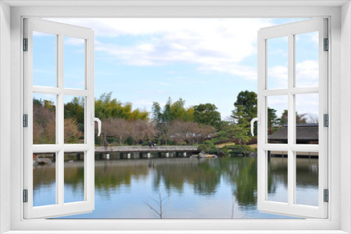 Fototapeta Naklejka Na Ścianę Okno 3D - 早春の東京都立川の国営昭和記念公園の日本庭園の風景