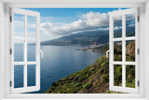 Fototapeta Naklejka Na Ścianę Okno 3D - La Palma, Canary Islands, view from viewpoint Mirador de San Juanito with view on Santra Cruz de la Palma and ocean. Blue sky background