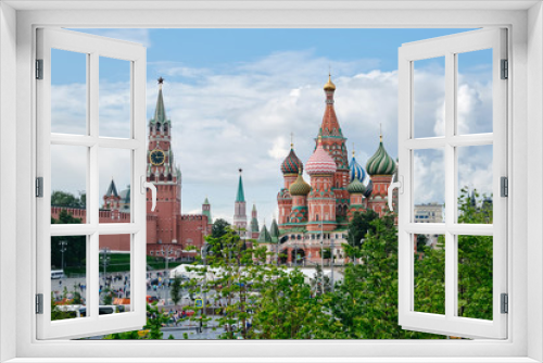 Fototapeta Naklejka Na Ścianę Okno 3D - MOSCOW, RUSSIA -AUGUST, 2019: Pokrovsky Cathedral St. Basil's and Moscow Kremlin from the Park Zaryadye in Moscow.