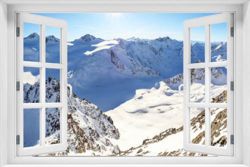 Fototapeta Naklejka Na Ścianę Okno 3D - View from Pitztal glacier into the high alpine mountain landscape with Wildspitze summit in winter with lots of snow and ice, Austrian Alps in Tirol Austria