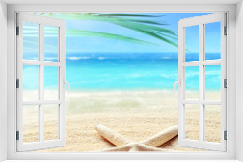 Fototapeta Naklejka Na Ścianę Okno 3D - Summer sand beach background. Palm leaf, starfish, sea and sky. Summer concept.