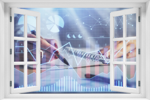 Double exposure of woman's hands making notes with forex graph hologram. Concept stock market analysis.