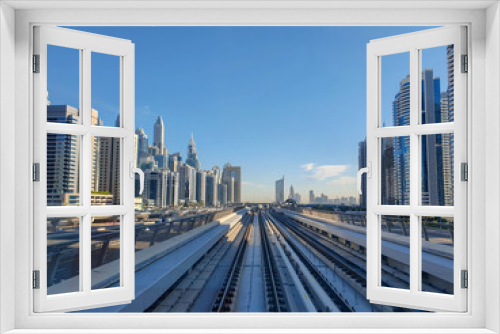 DUBAI, UAE - NOVEMBER 2019: Metro window view on Dubai Marina.