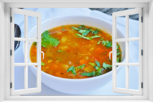 Fototapeta Naklejka Na Ścianę Okno 3D - A bowl of hot and sour vegetable soup at an Indian restaurant