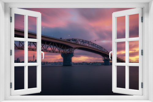 Fototapeta Naklejka Na Ścianę Okno 3D - Sunset over Auckland Harbour Bridge, New zealand