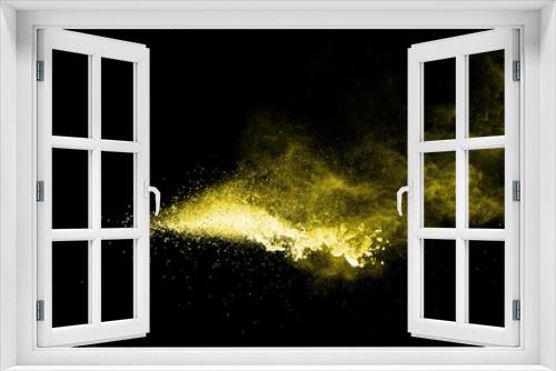 Fototapeta Naklejka Na Ścianę Okno 3D - Yellow powder explosion on black background.
