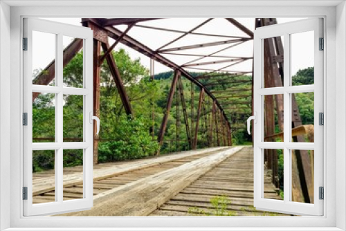 Fototapeta Naklejka Na Ścianę Okno 3D -  iron bridge over the river in nature