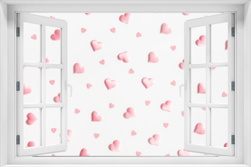 Valentine's Day background. Pink hearts on white background. Valentines day concept. Flat lay, top view