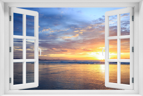 Fototapeta Naklejka Na Ścianę Okno 3D - Seascape with a vibrant sunset over a calm sea