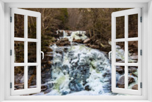 Fototapeta Naklejka Na Ścianę Okno 3D - Scenic view of frozen Bastion falls at upstate New York
