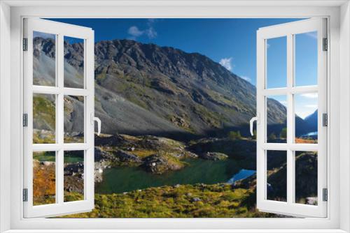 Fototapeta Naklejka Na Ścianę Okno 3D - Beautiful morning in a mountain valley, Altai. Small lake, rocky slopes.