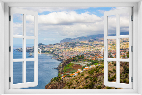 Fototapeta Naklejka Na Ścianę Okno 3D - Panoramic picture over the capitol city of Funchal on the Portugese island of Madeira at daytime