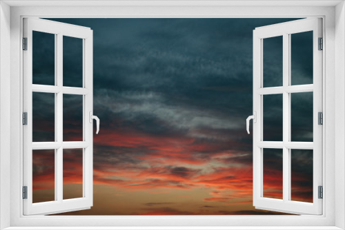 Fototapeta Naklejka Na Ścianę Okno 3D - Sky at sunset, gray red clouds closeup background texture