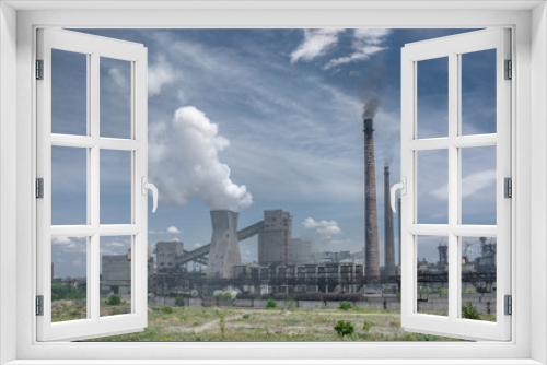 Fototapeta Naklejka Na Ścianę Okno 3D - The largest air pollutant in city Dnipro Ukraine is coke-chemical plant. Flue gas stacks emit hundreds tons of harmful substances a years into the atmosphere. Industrial landscape.