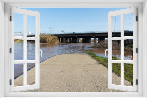 Fototapeta Naklejka Na Ścianę Okno 3D - Flooded river, floods in the city, climate change, flooded road