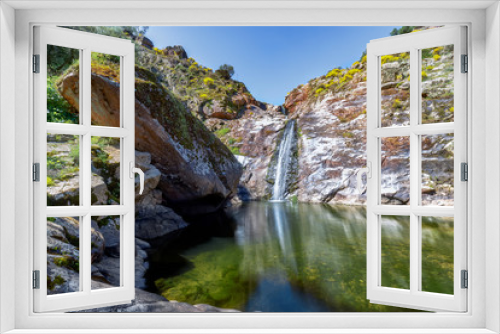 Fototapeta Naklejka Na Ścianę Okno 3D - Colorfull River waterfall in mountain. Waterfall mountain wall scene. Mountain waterfall view