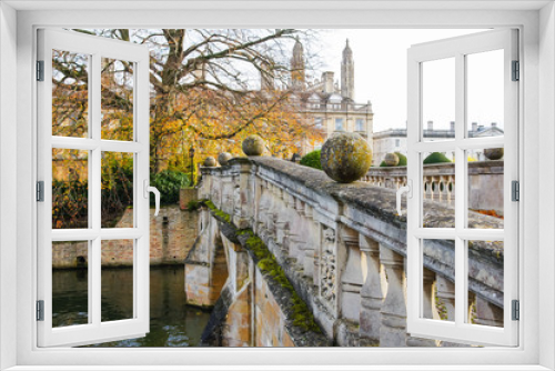 Fototapeta Naklejka Na Ścianę Okno 3D - Clare Bridge over the river Cam in autumn with Clare Collage in the background, Cambridge England United Kingdom UK