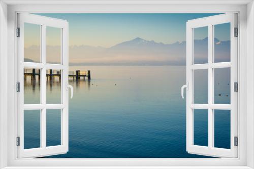 Fototapeta Naklejka Na Ścianę Okno 3D - Sonnenaufgang am See und Berge im Nebel - Morgen am Chiemsee