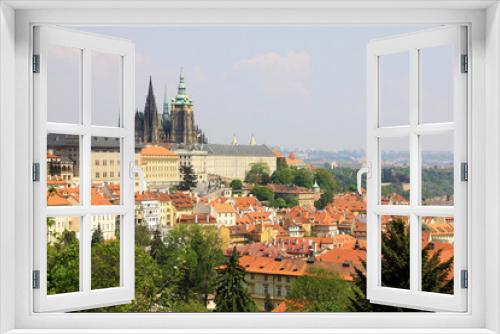 Fototapeta Naklejka Na Ścianę Okno 3D - View on the spring Prague gothic Castle with the green Nature