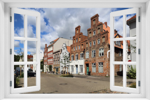 Fototapeta Naklejka Na Ścianę Okno 3D - Street in historical Lubeck, Germany