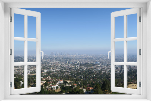 Panoramic view of LA downtown and suburbs from the beautiful Griffith Observatory in Los Angeles