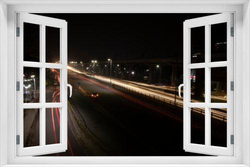 Fototapeta Naklejka Na Ścianę Okno 3D - Speed Traffic light trails on highway, long exposure, urban background and dark sky