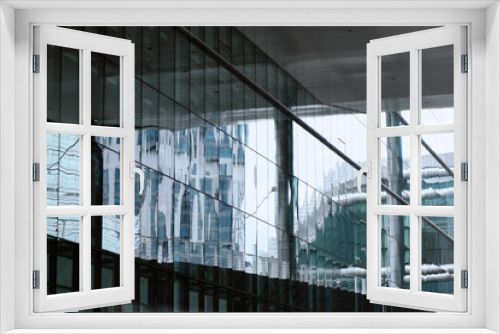Fototapeta Naklejka Na Ścianę Okno 3D - Glass Facade of a Modern Urban Building