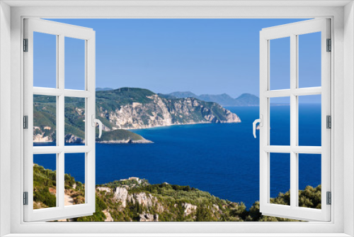 Fototapeta Naklejka Na Ścianę Okno 3D - View to rocky peninsula and bay at Corfu island, Greece.