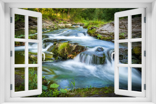Fototapeta Naklejka Na Ścianę Okno 3D - Mountain stream rapids  in motion blur
