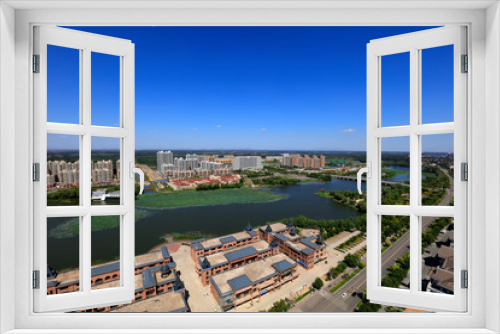 Fototapeta Naklejka Na Ścianę Okno 3D - waterfront city architectural scenery, China