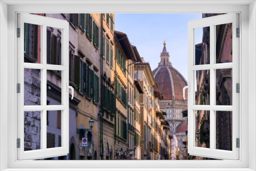 Fototapeta Naklejka Na Ścianę Okno 3D - The Florence Cathedral from the streets of Florence, Italy.