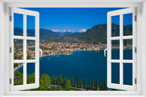Fototapeta Naklejka Na Ścianę Okno 3D - Panoramic view of the center of Salo, Italy. Lake Garda, blue sky, mountains