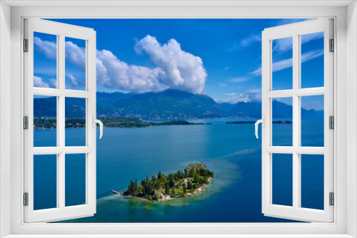 Fototapeta Naklejka Na Ścianę Okno 3D - Panoramic view of the island of San Biagio, Italy. Lake Garda, blue sky	