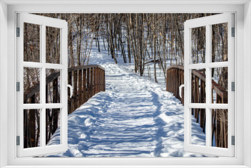 Fototapeta Naklejka Na Ścianę Okno 3D - bridge in winter forest