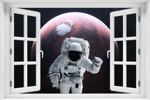 Fototapeta Naklejka Na Ścianę Okno 3D - Astronaut and Mars. Red planet of the solar system. 3D render. Science fiction. Elements of this image furnished by NASA