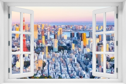 Fototapeta Naklejka Na Ścianę Okno 3D - Exciting Spectacular Panoramic View of Tokyo Skyline at Blue Hour in Japan with a Line of Skyscrapers And Renowned Tokyo Tower.
